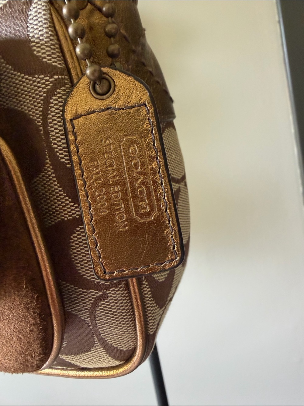 Coach Brown Signature Canvas Shoulder Bag with Metallic Bronze Leather Accents - Picture 5 of 16